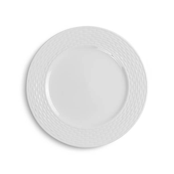 istock White ceramic plate top view. Close up. Isolated on white background 1057896328