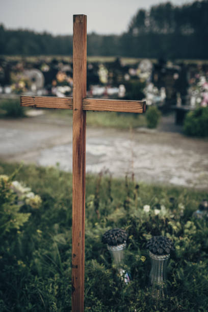 istock Wooden cross in the cemetery 1057899832