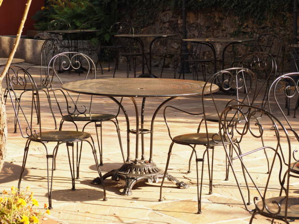 istock metallic typical french bar table and chairs 1057901918
