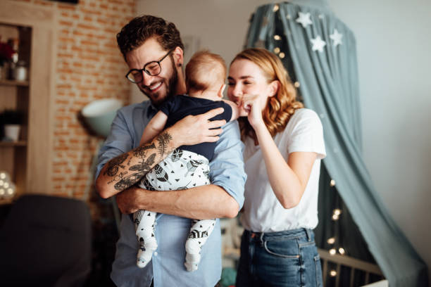 istock Parents embracing their baby boy 1057902038