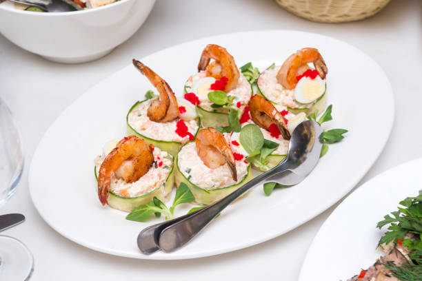 istock appetizer with shrimp cheese and zucchini on a plate 1057902392