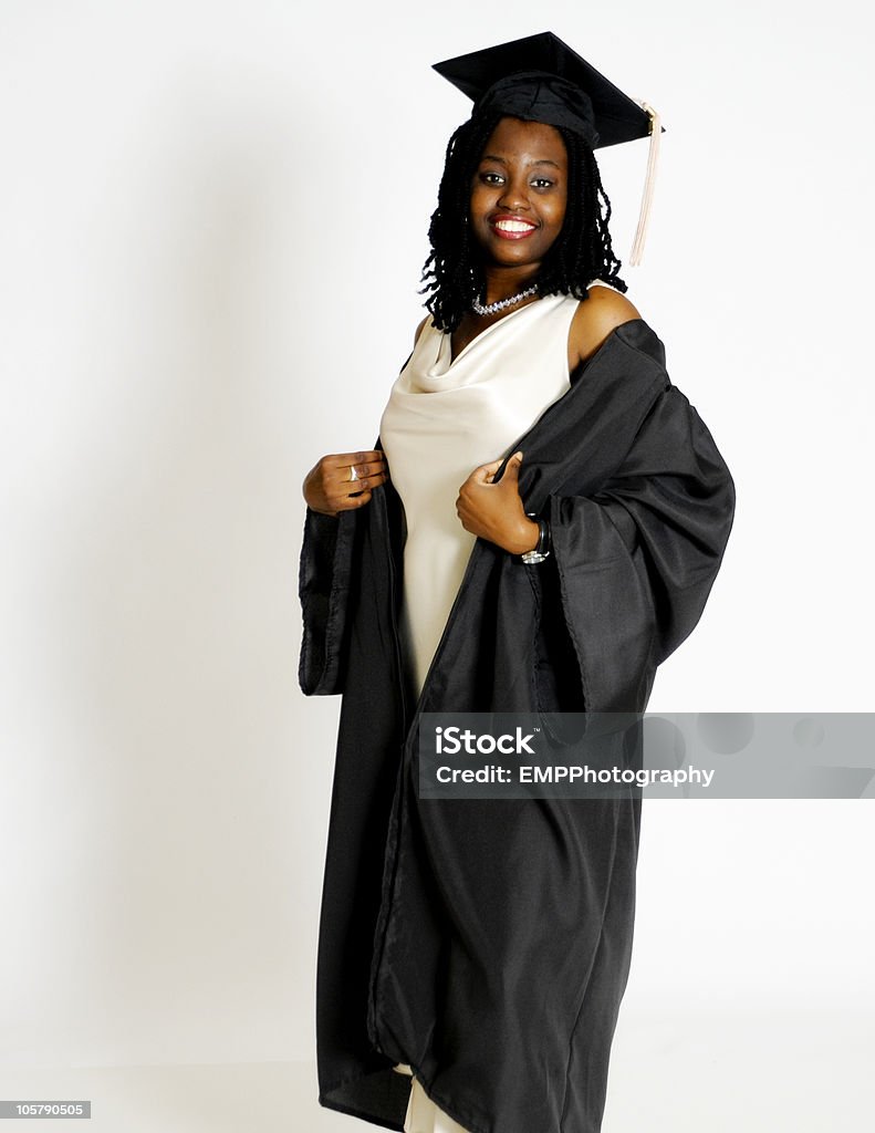 African American Woman Graduate with Mortar Board  Achievement Stock Photo