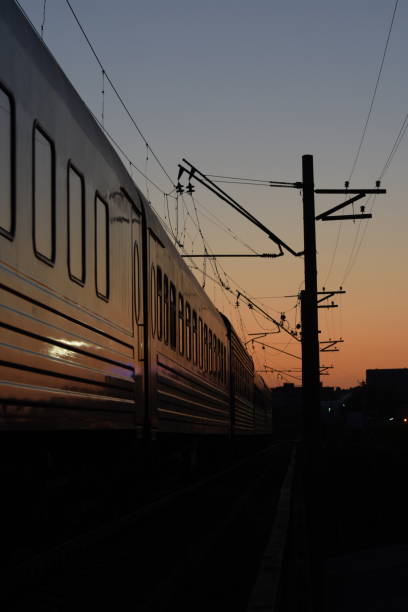 istock Train railway Rails at sunset in the evening 1057907180