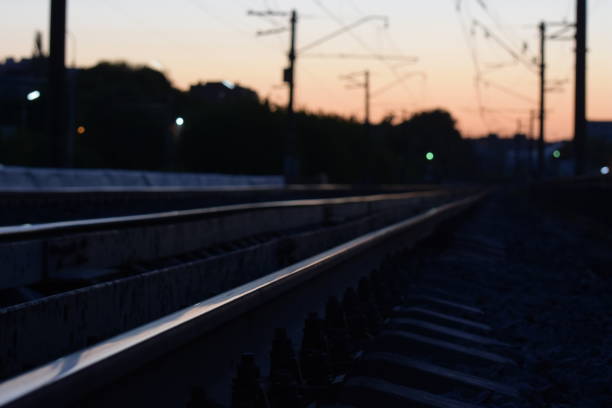 istock Railway rails at sunset in the evening 1057907190