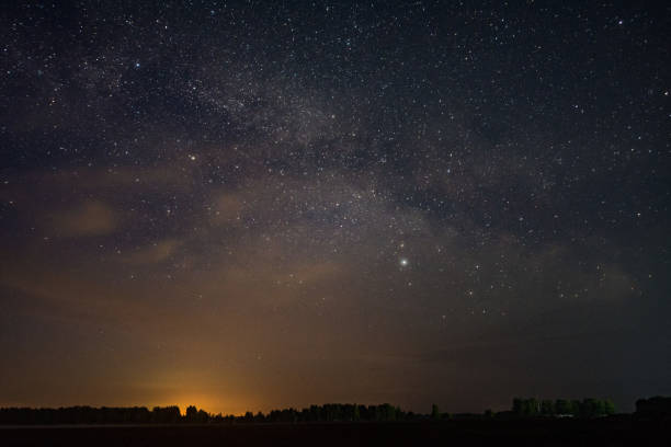 istock The milky way over the field 1057907614