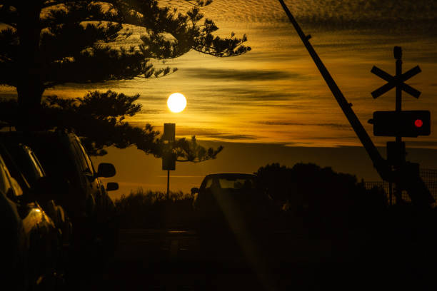 istock silhouette landscape at sunset orange 1057912906