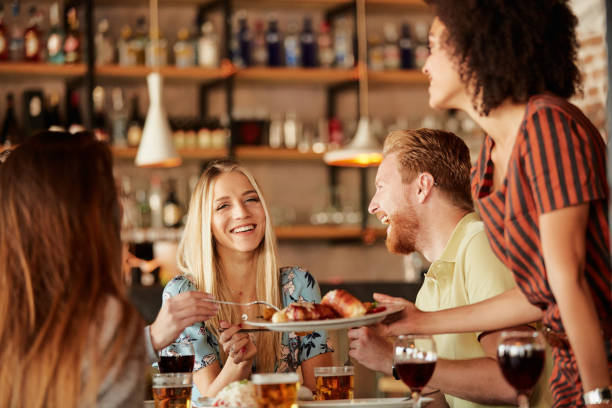 istock Friends having dinner at home. 1057920548
