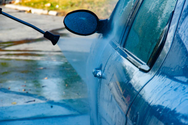 istock High-pressure washing car outdoors 1057920664