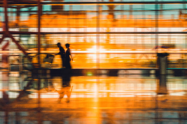 istock Travelers at airport terminal. 1057921582