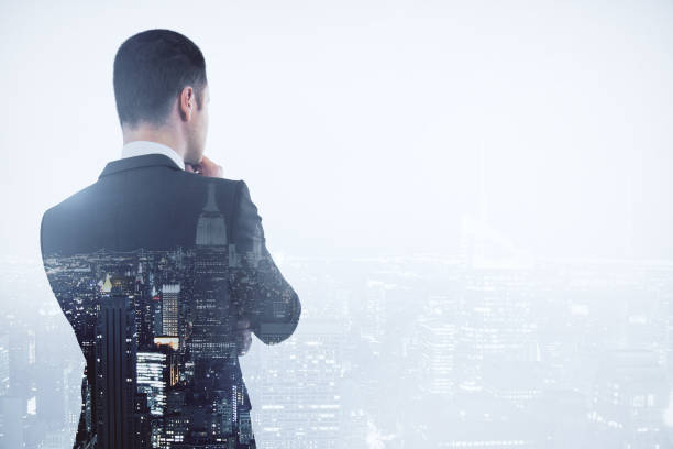 istock Thoughtful businessman in city 1057926382