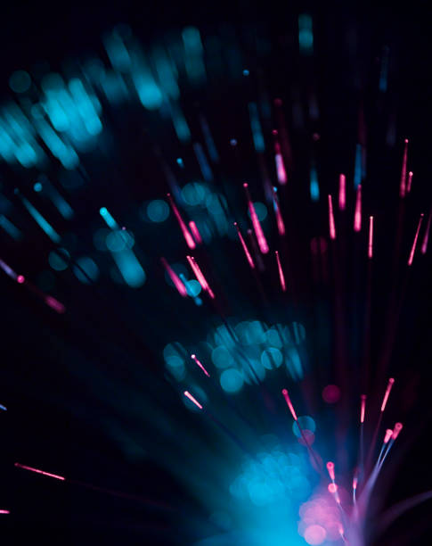 istock Abstract background with optical Fibers 1057926584