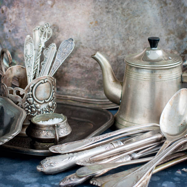 istock Vintage old ware made of nickel silver, square 1057928826