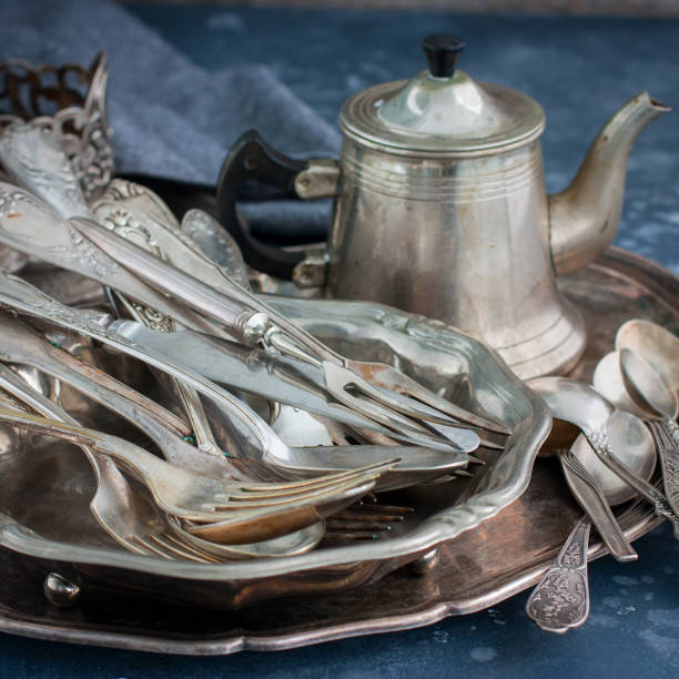 istock Vintage old ware made of nickel silver, square 1057928956