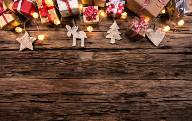 istock Christmas decoration on wooden background 1057929822