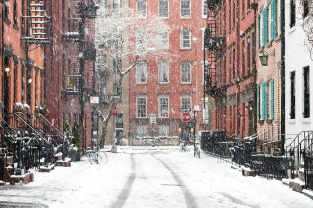 Snow covered streets in New York City Snowy winter scene on Gay Street in the Greenwich Village neighborhood of Manhattan in New York City winter city stock pictures, royalty-free photos & images