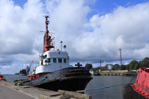 istock Transshipment of goods in port. 1057932222