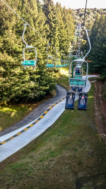 Skyline Gondola Cableway in Rotorua, New Zealand Rotorua, New Zealand - September 07, 2015: Skyline Gondola Cableway in Rotorua, New Zealand rotorua luge stock pictures, royalty-free photos & images
