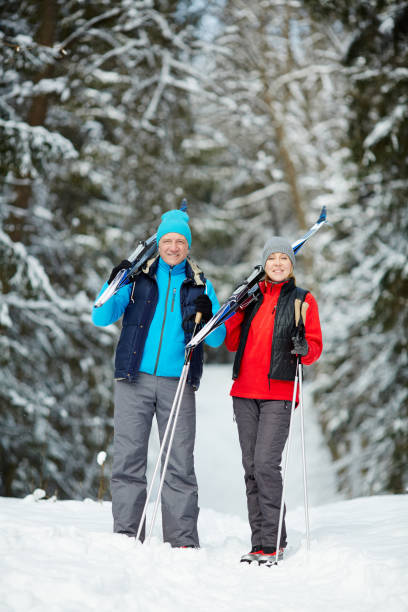 istock Skiers in winter forest 1057936782