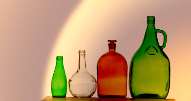 istock Background texture, pattern. Empty bottles. Recycling of household items, including glass, 1057938758