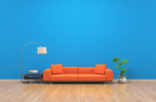 istock Blue wall living room concept 1057938764
