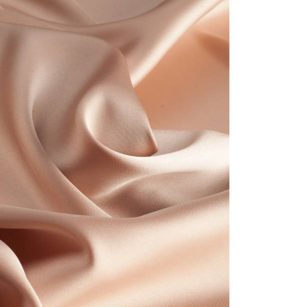 istock tissue, textile, cloth, fabric, material, texture. beige color 1057938862