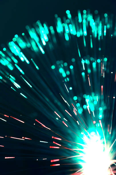 istock Abstract background with optical Fibers 1057938956