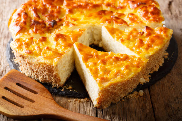 istock Homemade rice pie with cottage cheese, eggs and sugar close-up. horizontal 1057939296