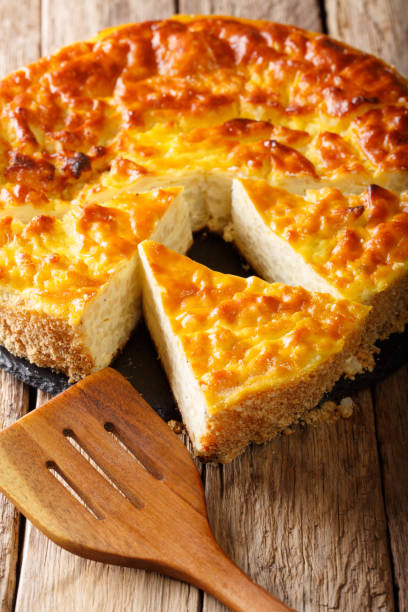 istock rice pie with ricotta cheese, eggs and sugar close-up. vertical 1057939424