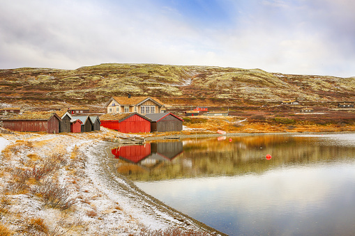 First snow in October at the lake Orkel located in the Oppdal area, Norway