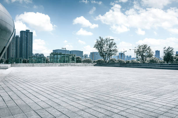 istock Panoramic skyline and buildings with empty concrete square floor 1057943078