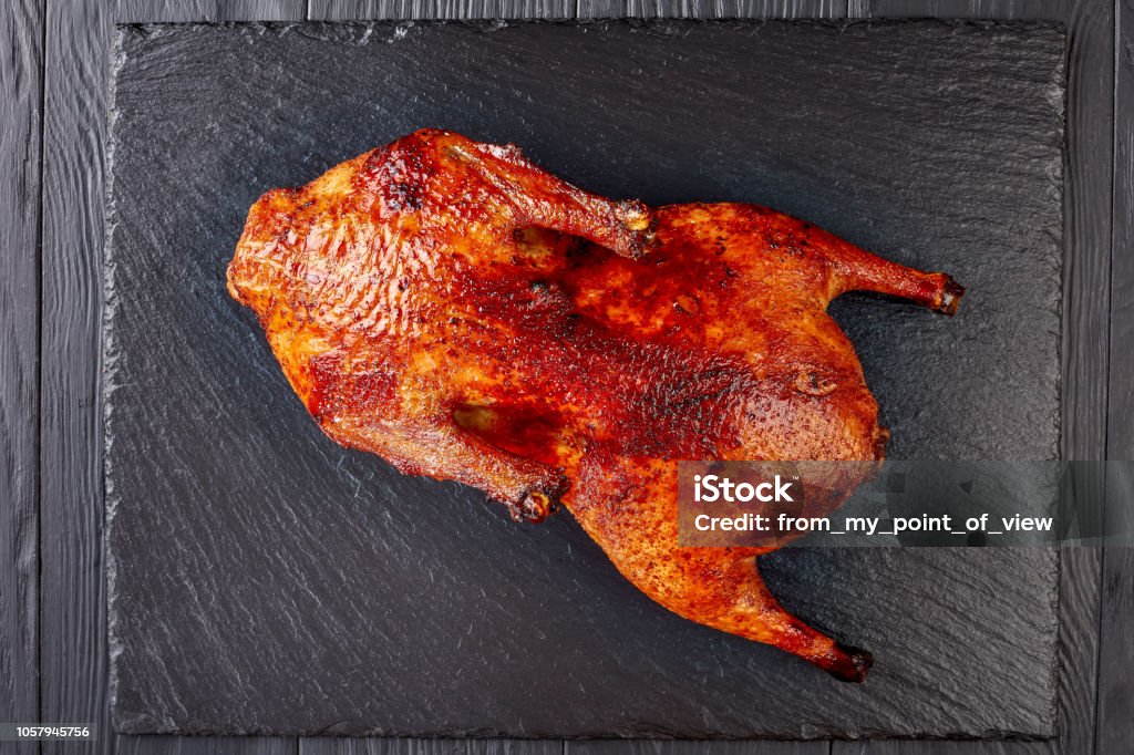 Whole Grilled Duck With Crispy Skin Stock Photo - Download Image Now