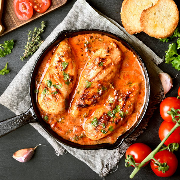 istock Chicken breast with tomato sauce 1057946032