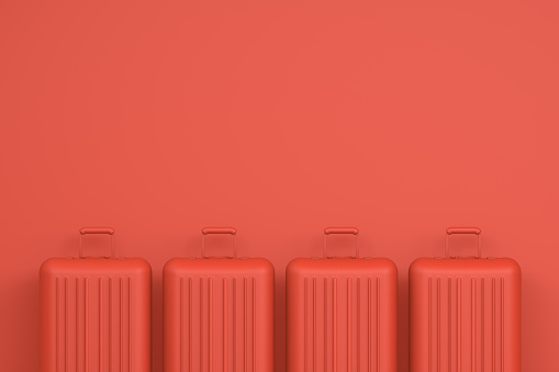 Minimal travel concept, suitcase on colorful background.