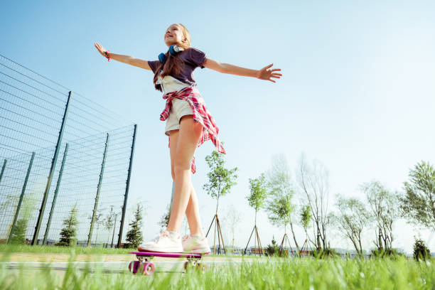 istock Relaxed teenager spending her day in park 1057950734