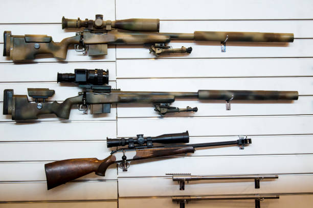 istock Gun wall rack with sniper rifles 1057964376