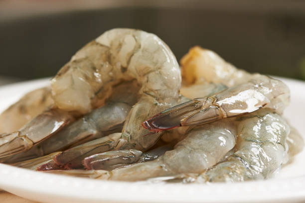 istock Fresh prawns in a bowl preparing to cook 1057964884