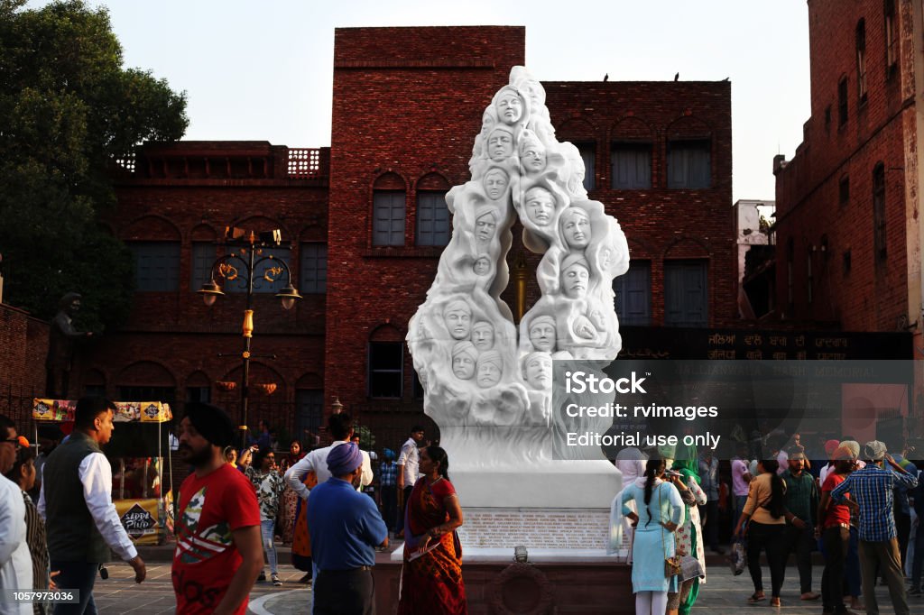 Jallianwala Bagh Martyr's Memorial, Amritsar India Amritsar Punjab, India – October 12, 2018 : South end of Golden Temple Road, Jallianwala Bagh Martyr's Memorial. Jallianwala Bagh Martyr’s Memorial is the one of the attraction points of the visitors. The Jallianwala Bagh massacre, also known as the Amritsar massacre, took place on 13 April 1919 when troops of the British Indian Army under the command of Colonel Reginald Dyer fired rifles into a crowd of Indians, who had gathered in Jallianwala Bagh, Amritsar, Punjab. The Jallianwalla Bagh is a public garden of 6 to 7 acres (28,000 m2), walled on all sides, with five entrances. Amritsar Stock Photo