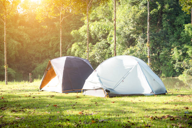 istock tourist tent camping at the mountain 1057976652