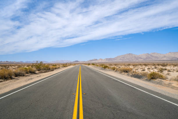 istock Empty Desert Highway running from California to Arizona 1057977682