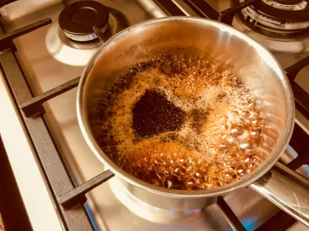 Tea, Boiling, Freshness, Kitchen - Overhead image of a open vessel boiling the tea on a stove