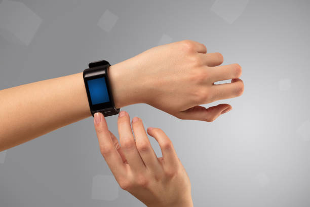 istock Female hand wearing smartwatch 1057981372