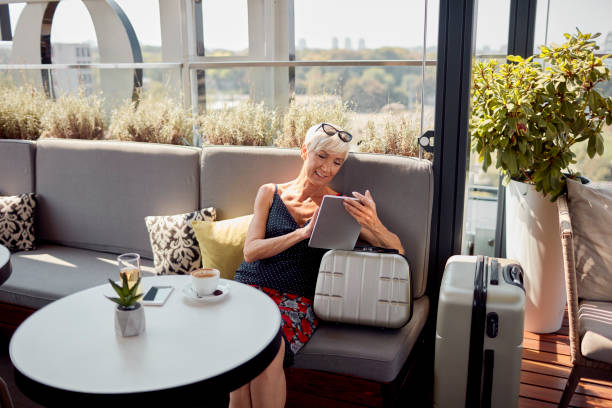 istock Senior Woman Traveling 1057981602