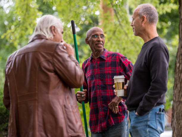 istock Senior neighbors friendly talk 1057981810