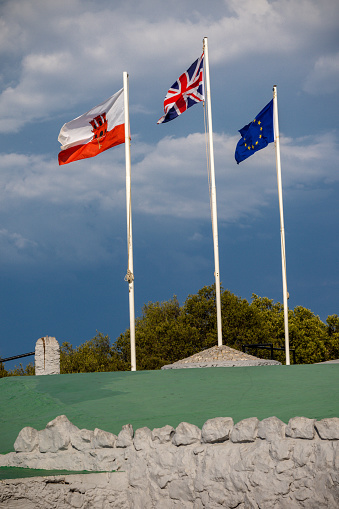 British flag on a background of Ibrahim-al-Ibrahim Mosque at Europa Point, Gibraltar