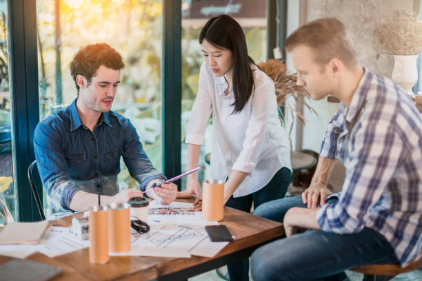 istock creativity brainstorm ideas concept with business partnet meeting workshop in coffeeshop and reflect of garden on window 1057984856