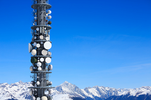 Telecommunication tower against blue sky.  Antenna, Radio and satellite pole. Communication technology.