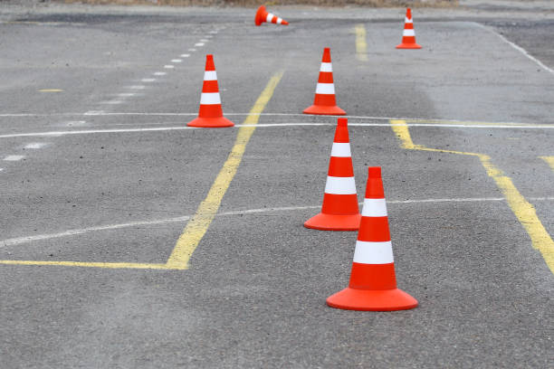 istock Bright road cones on the asphalt. 1057987300