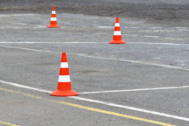 istock Bright road cones on the asphalt. 1057988694