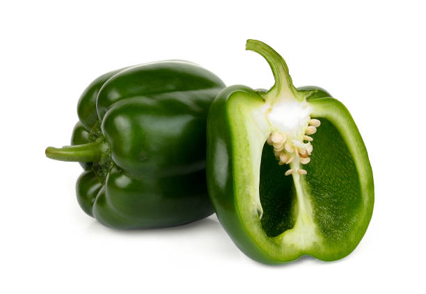istock whole and half green bell pepper isolated on white background 1057989304