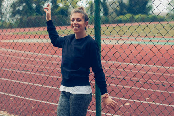 istock Sporty woman exercising 1057990312